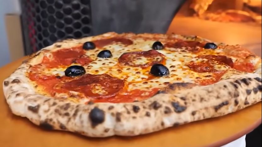 Hvorfor er pizza et symbol på Italia?